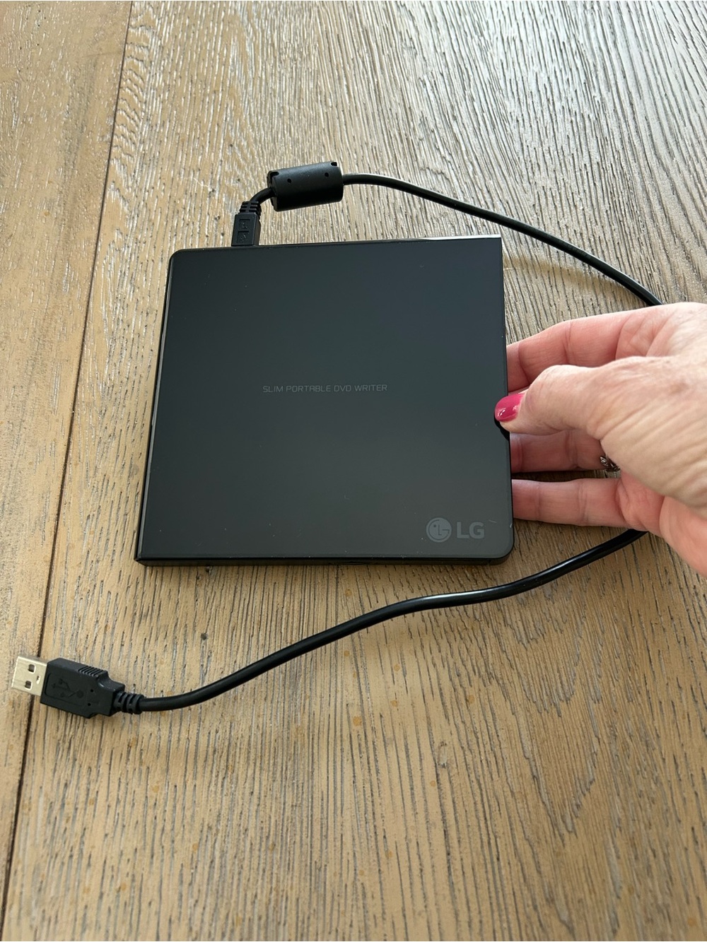 LG Slim Portable DVD Writer (plastic sleeve still in place on writer)